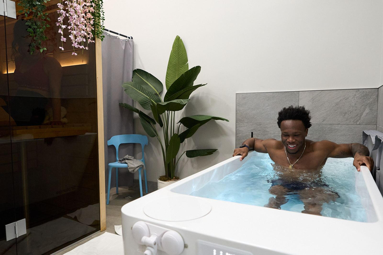 Guest in the cold plunge at LIVE Hydration Spa Long Island City